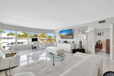 LIVE THE LIFESTYLE IN THIS 2/BED/ 2 BATH CONDO WITH SPLIT FLOOR