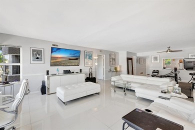 LIVE THE LIFESTYLE IN THIS 2/BED/ 2 BATH CONDO WITH SPLIT FLOOR