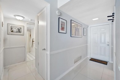 LIVE THE LIFESTYLE IN THIS 2/BED/ 2 BATH CONDO WITH SPLIT FLOOR