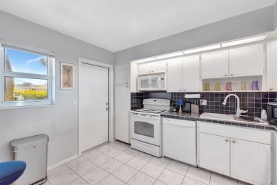 LIVE THE LIFESTYLE IN THIS 2/BED/ 2 BATH CONDO WITH SPLIT FLOOR