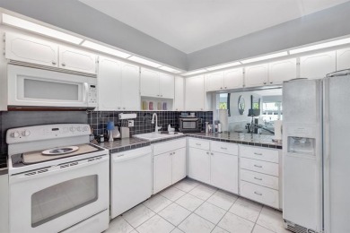 LIVE THE LIFESTYLE IN THIS 2/BED/ 2 BATH CONDO WITH SPLIT FLOOR