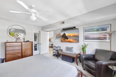 LIVE THE LIFESTYLE IN THIS 2/BED/ 2 BATH CONDO WITH SPLIT FLOOR