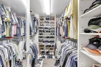 LIVE THE LIFESTYLE IN THIS 2/BED/ 2 BATH CONDO WITH SPLIT FLOOR