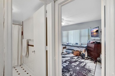 LIVE THE LIFESTYLE IN THIS 2/BED/ 2 BATH CONDO WITH SPLIT FLOOR