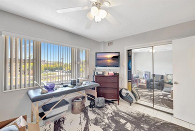 LIVE THE LIFESTYLE IN THIS 2/BED/ 2 BATH CONDO WITH SPLIT FLOOR