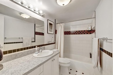 LIVE THE LIFESTYLE IN THIS 2/BED/ 2 BATH CONDO WITH SPLIT FLOOR