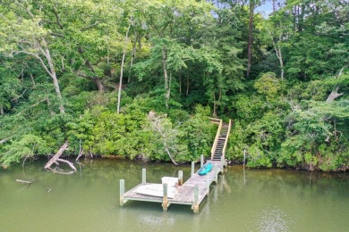 This high-top gem overlooking John's Creek affords privacy