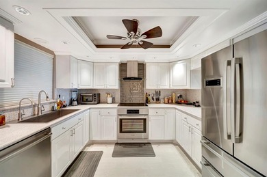 Live the coastal lifestyle in this updated 2BR/2BA corner unit