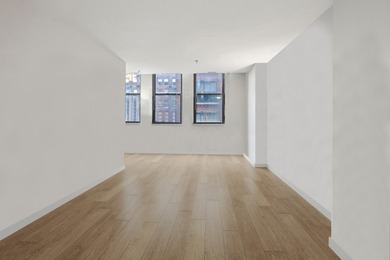 Experience vibrant city living in this spacious corner 2-bedroom