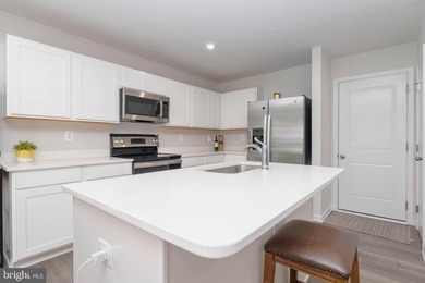 WELCOME HOME!!!  Gleaming Quartz countertops, bright white