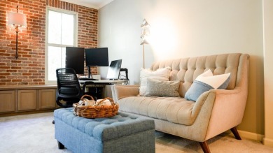 Located in The Plaza community, this stylish, third-floor condo