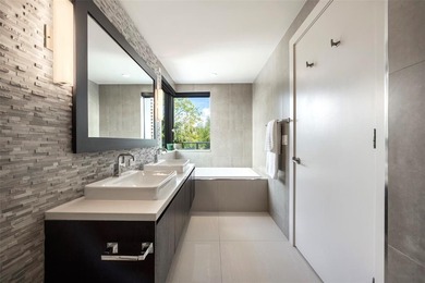 Beach-chic 2-story contemporary glass wrapped corner residence