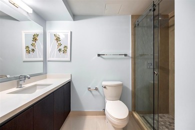 Beach-chic 2-story contemporary glass wrapped corner residence