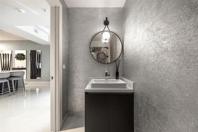 Beach-chic 2-story contemporary glass wrapped corner residence