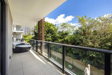 Beach-chic 2-story contemporary glass wrapped corner residence