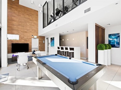 Beach-chic 2-story contemporary glass wrapped corner residence