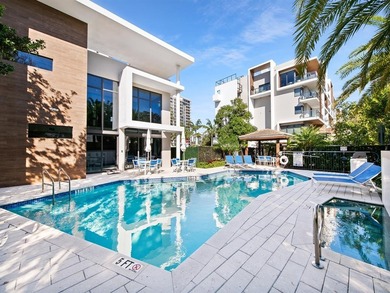 Beach-chic 2-story contemporary glass wrapped corner residence