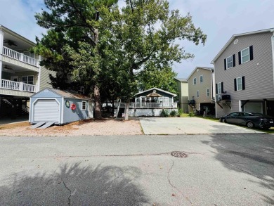 LARGE DOUBLE WIDE BEACH HOUSE ON ONE OF THE LARGEST LOTS IN
