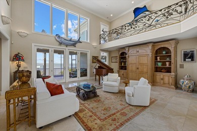 2 DEEP-WATER DOCKS AND A COVERED 10,000 LB LIFT. 5 BEDROOMS AND