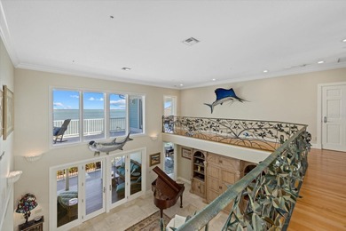 2 DEEP-WATER DOCKS AND A COVERED 10,000 LB LIFT. 5 BEDROOMS AND