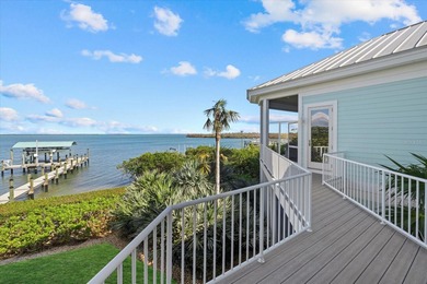 2 DEEP-WATER DOCKS AND A COVERED 10,000 LB LIFT. 5 BEDROOMS AND