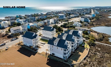 Discover unparalleled coastal living at 607a S Topsail Drive