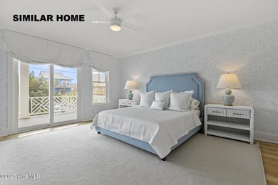 Discover unparalleled coastal living at 607a S Topsail Drive
