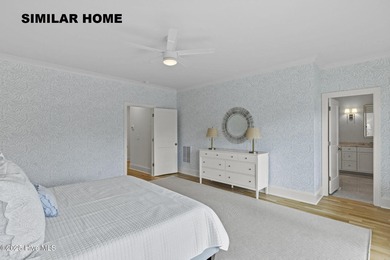 Discover unparalleled coastal living at 607a S Topsail Drive