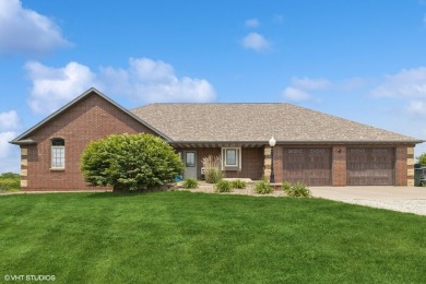 This meticulously cared-for 4-bedroom, 4-bathroom walk-out ranch
