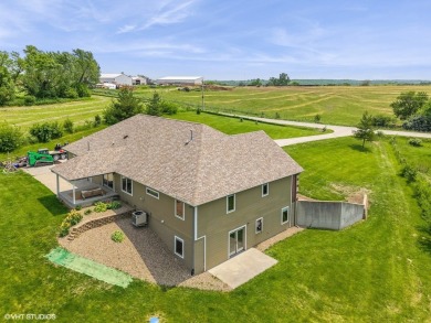 This meticulously cared-for 4-bedroom, 4-bathroom walk-out ranch
