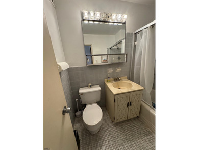 OCEANFRONT building offering an updated one-bedroom condo with