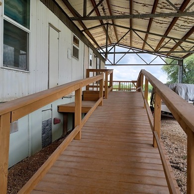 Lake front on Lake Medina with boat ramp and dock. Great views