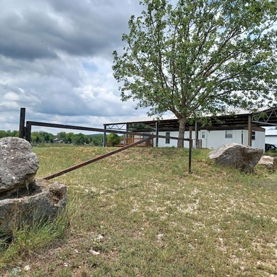 Lake front on Lake Medina with boat ramp and dock. Great views