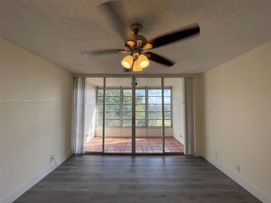 A FULLY REMODELED UNIT, IT IS BRIGHT AND HAS GREAT VIEWS