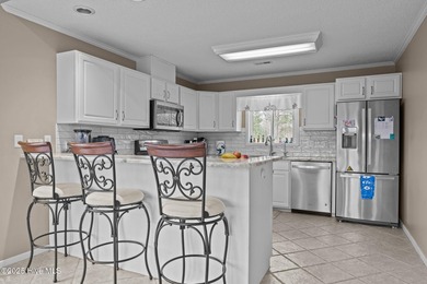 Stunning 4-bedroom, 3.5-bathroom home nestled on Hole 15 of the