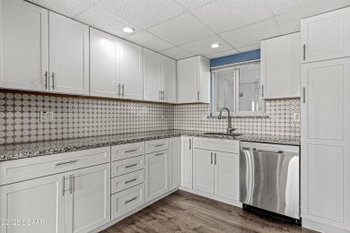 Stunning three bedroom remodeled end unit with panoramic water