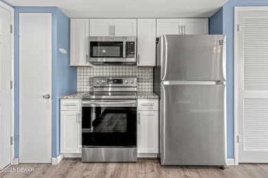 Stunning three bedroom remodeled end unit with panoramic water