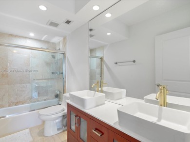 Completely renovated corner unit in The Arlen House with