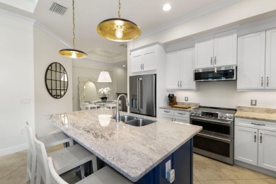 Welcome to one of the rare 201 coach homes in the coveted Isles