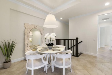 Welcome to one of the rare 201 coach homes in the coveted Isles