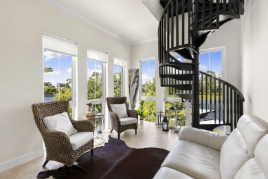 Welcome to one of the rare 201 coach homes in the coveted Isles