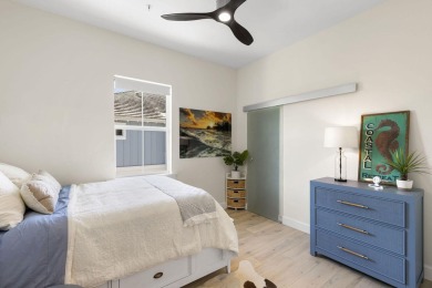 Welcome to one of the rare 201 coach homes in the coveted Isles