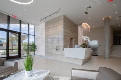 Live the South Beach Lifestyle! This luxurious 3-bedroom, 3-bath