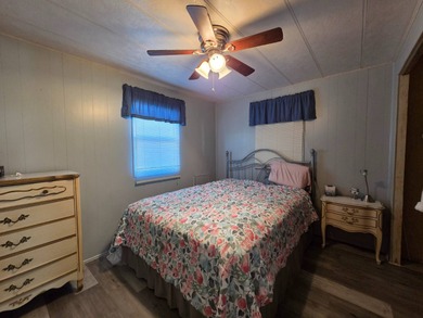 This 2 bed 1.5 bath home is located in Teakwood Village a 5 star