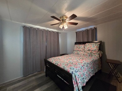 This 2 bed 1.5 bath home is located in Teakwood Village a 5 star