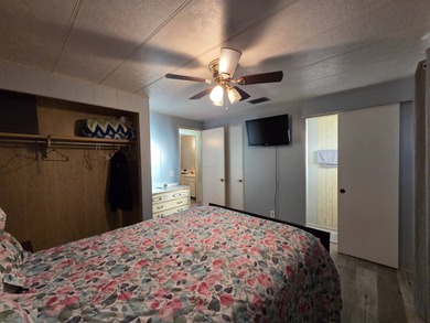 This 2 bed 1.5 bath home is located in Teakwood Village a 5 star