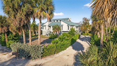 Welcome to 4400 Gulf Pines Drive, an elevated coastal home set