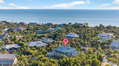 Welcome to 4400 Gulf Pines Drive, an elevated coastal home set