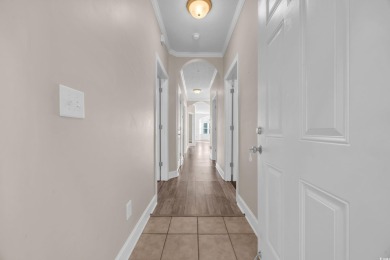 Discover this charming 3-bedroom, 2-bath condo in the gated