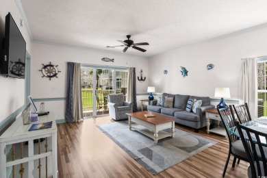 Check out this upgraded first-floor end unit in the prestigious